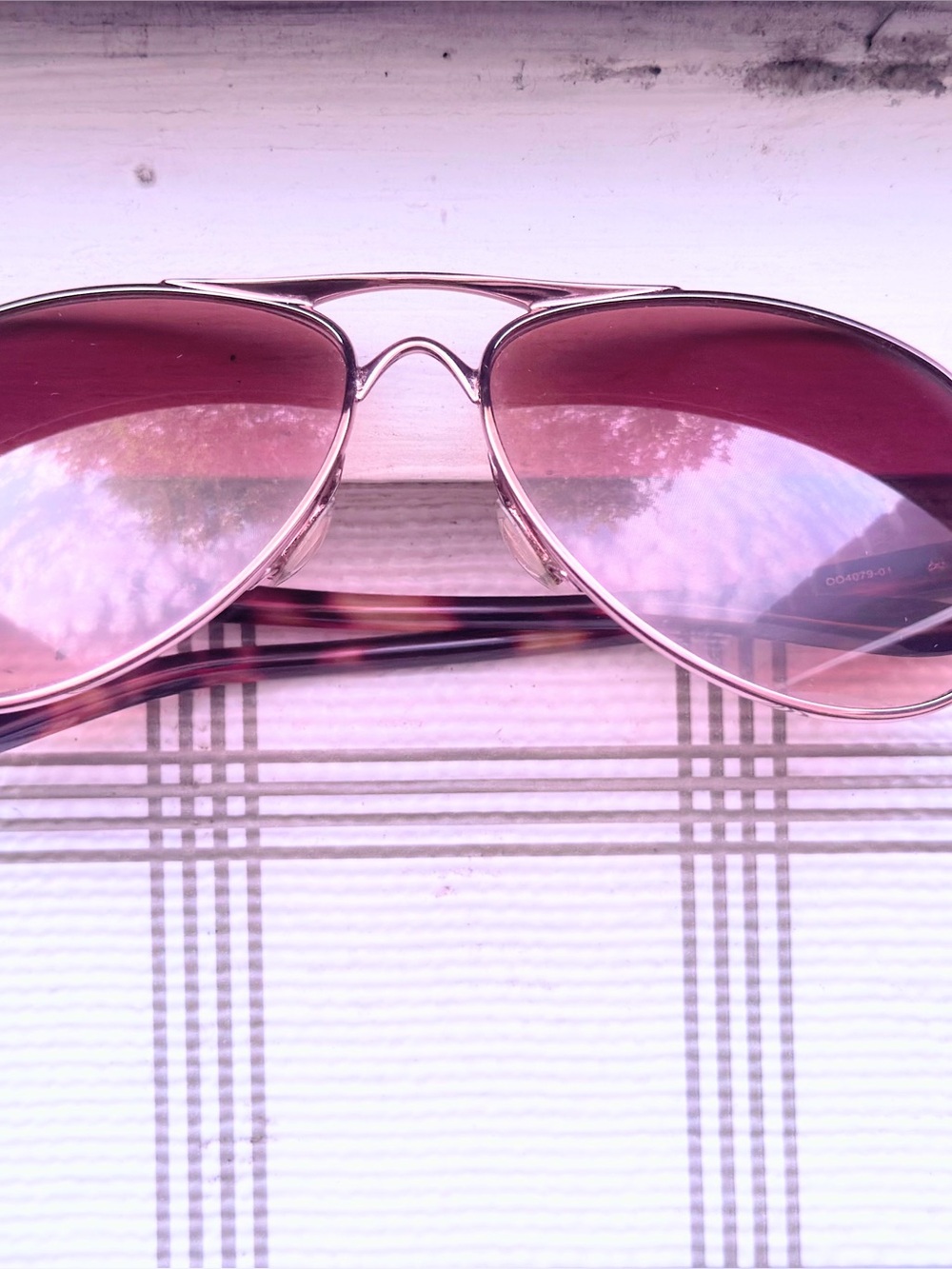 Oakley Women's Rose Gold frame, brownish lens. Aviator Sunglasses - Picture 8 of 10